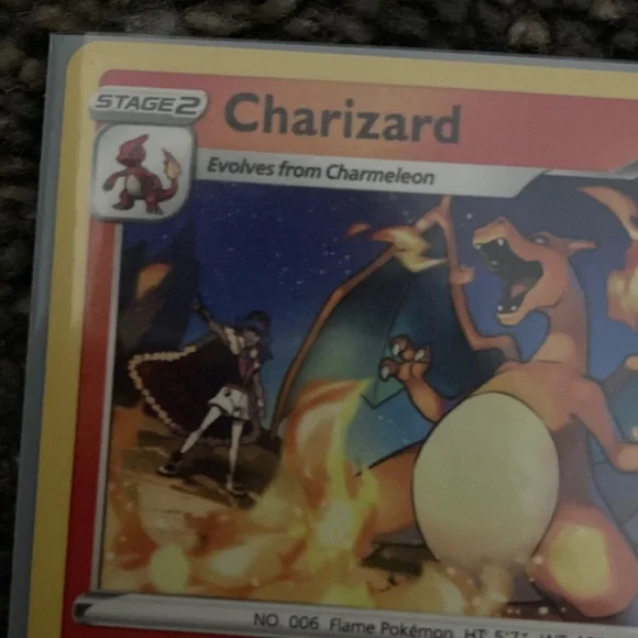 Pokemon Charizard Trading Card - Red and Yellow also has a sleeve - Picture 6 of 9